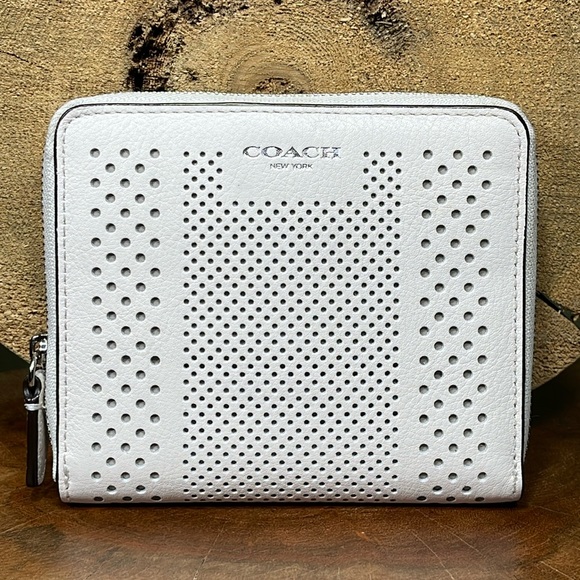 Coach Handbags - HTF COACH BLEECKER STRIPE PERFORATED LEATHER MEDIUM ZIP WALLET